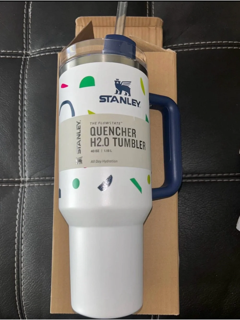 Stanley White Tumbler with Blue Handle and Multicolor Accents
